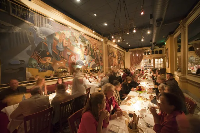 The warmly lit Sotto Sopra dining room